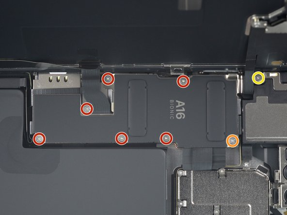 <span id='buoc-5-mo-oc-nep-bao-ve-dau-cap-man-hinh'></span>Bước 5. Mở ốc nẹp bảo vệ đầu cáp màn hình iPhone 14 Pro Max